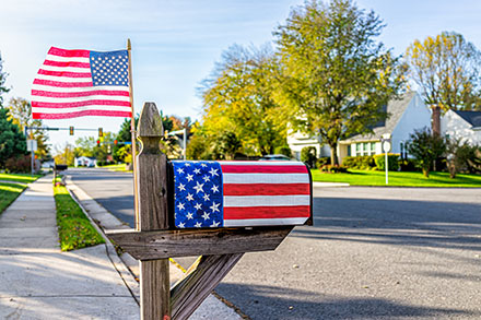 a mailbox with an american flag painted on it