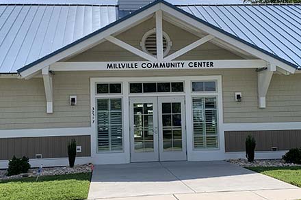 the front entrance of a community center building