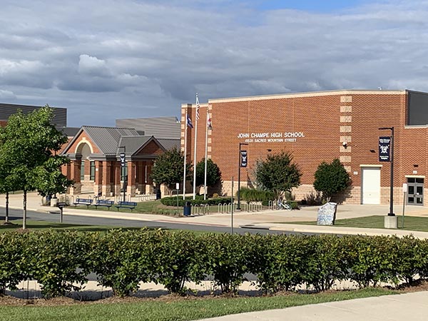 a brick building with a clock on the front of it