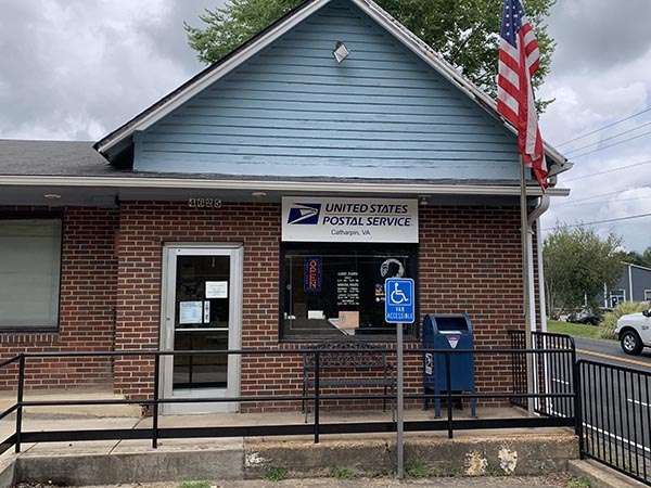 a blue building with a flag on top of it