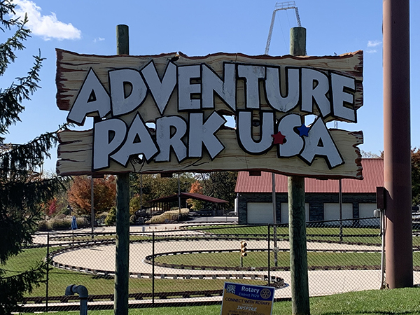 a sign for a park that says adventure park usa